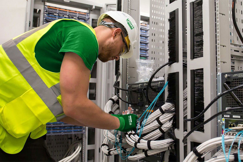 Network cabling contractor installing Cat6 cable