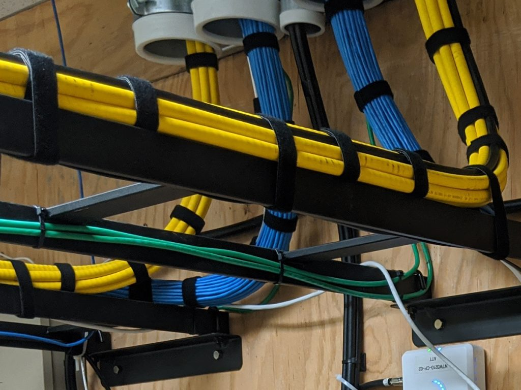 Network wiring run through a large workspace