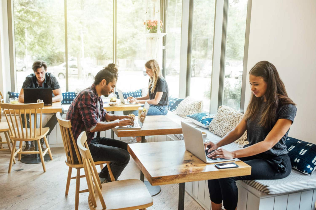 Customers using fast guest Wi-Fi in an Austin coffee shop
